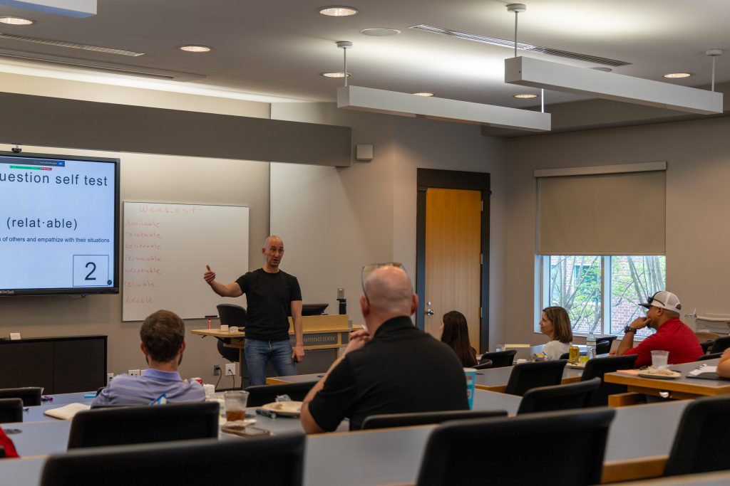 A person talking to a large group.